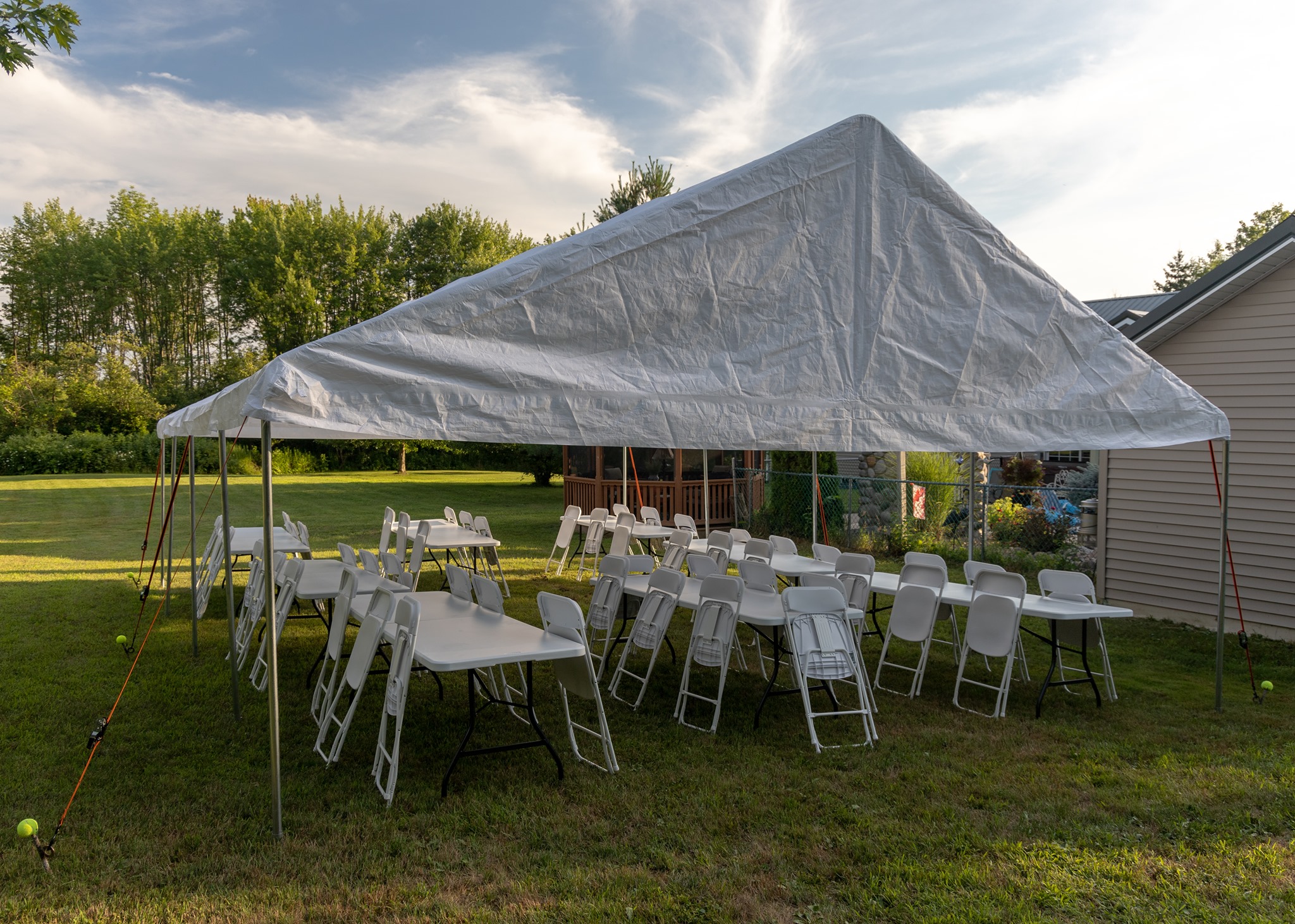 20’x30′ Tent with Tables & Chairs Hefti Rentals